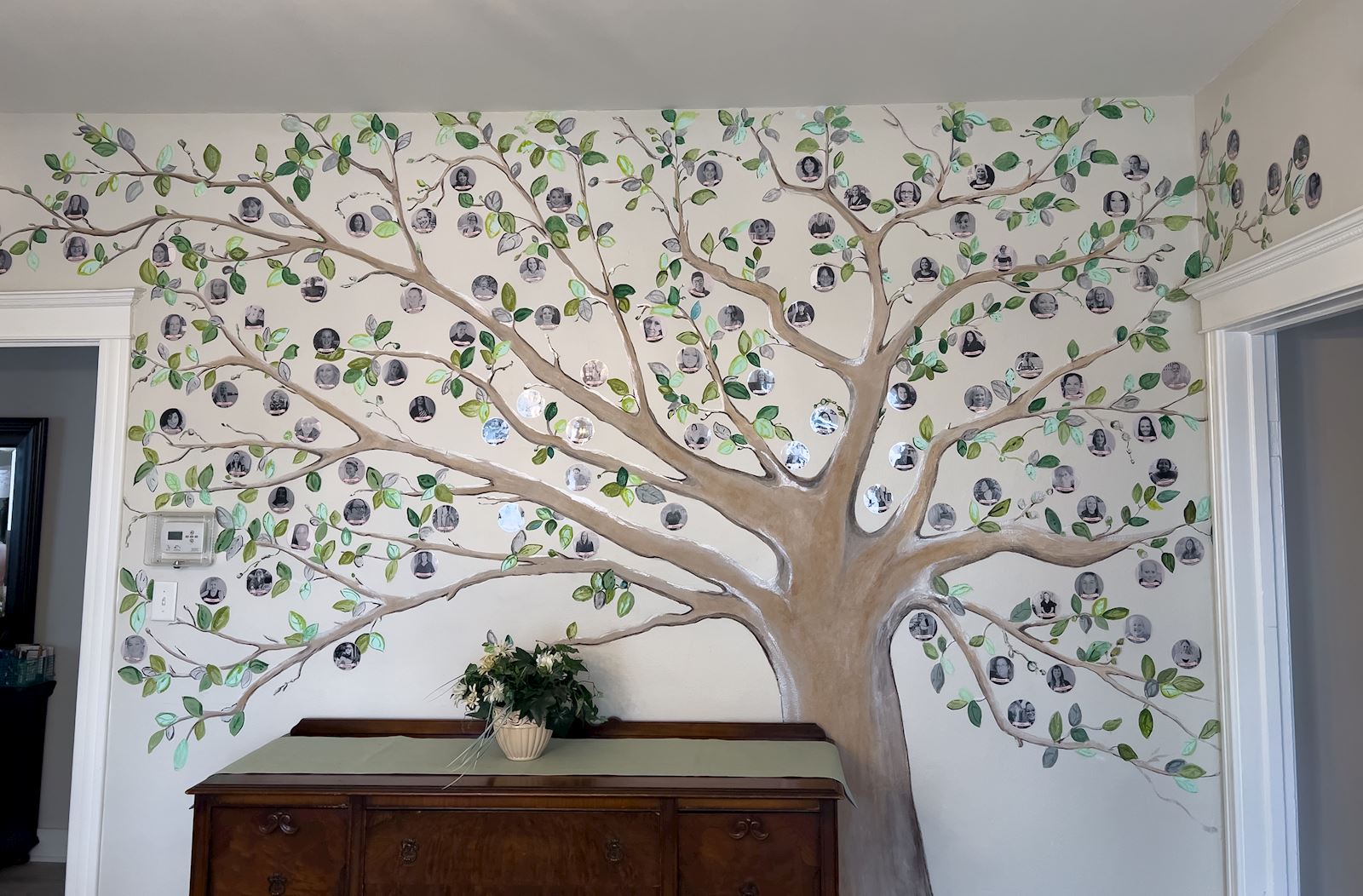 Tree mural displaying photos of Pearls